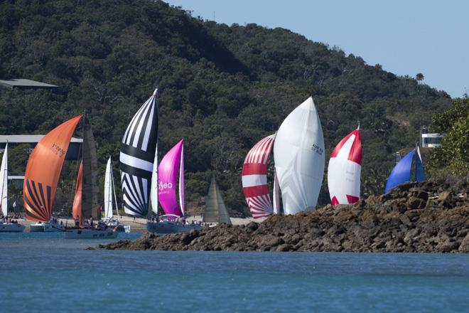Fleet past Dent Island on day 2 of Audi Hamilton Island Race Week photo copyright Andrea Francolini taken at Royal Hamilton Yacht Club and featuring the IRC class