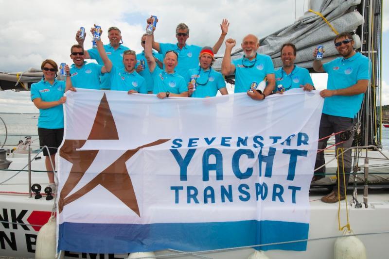 Happy crew on Bank von Bremen after the finish of the Sevenstar Round Britain and Ireland Race photo copyright Patrick Eden / RORC taken at Royal Ocean Racing Club and featuring the IRC class