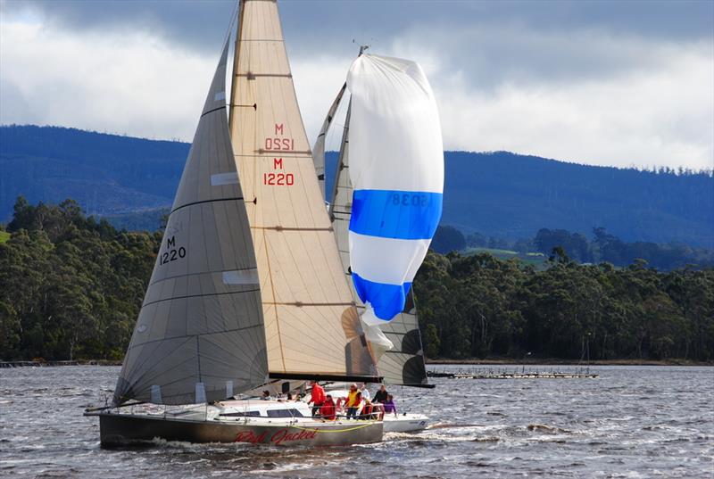 Red Jacket settles for a two-sail reach while Madness struggles to set a spinnaker in the Cock of the Huon photo copyright Peter Campbell taken at Derwent Sailing Squadron and featuring the IRC class