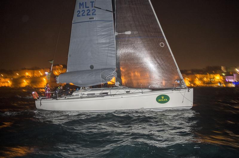 ARTIE crossing the finish line in Marsamxett Harbour to become winner of the Rolex Middle Sea Race photo copyright Kurt Arrigo / Rolex taken at Royal Malta Yacht Club and featuring the IRC class