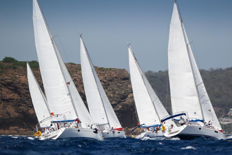 Bareboat fleet enjoying a superb day on the water on day 2 at Antigua Sailing Week photo copyright Paul Wyeth / www.pwpictures.com taken at Antigua Yacht Club and featuring the IRC class