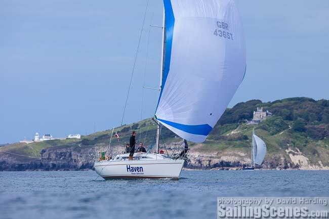 Enigma sailing past Durlston Head and Old Harry on Monday morning during the 2015 RORC Myth of Malham Race photo copyright David Harding / www.sailingscenes.com taken at Royal Ocean Racing Club and featuring the IRC class