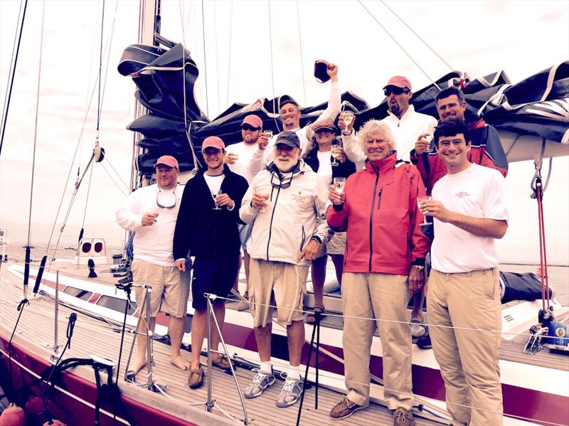 The crew of Lady B celebrates their finish of the Transatlantic Race photo copyright James Bremridge taken at Royal Yacht Squadron and featuring the IRC class