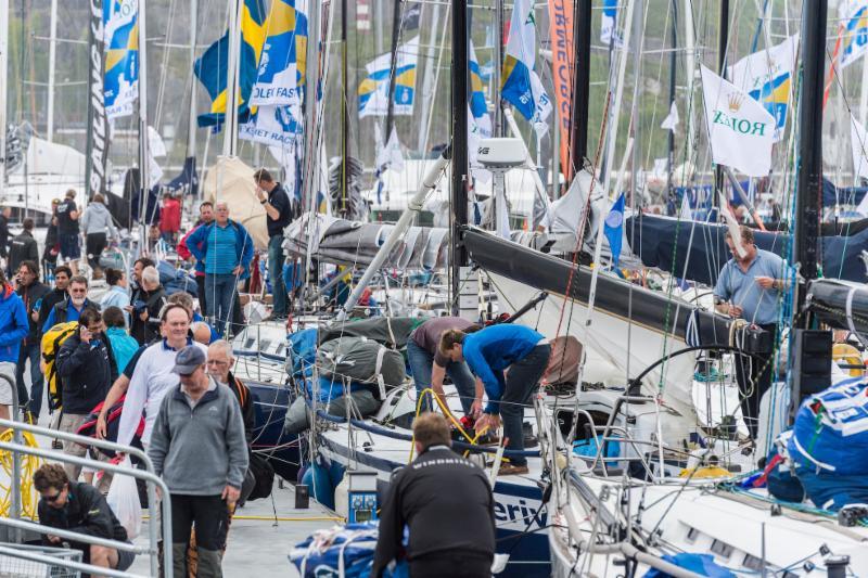 Dockside at the finish of the Rolex Fastnet Race in Plymouth Yacht Haven photo copyright Rolex / Kurt Arrigo taken at  and featuring the IRC class