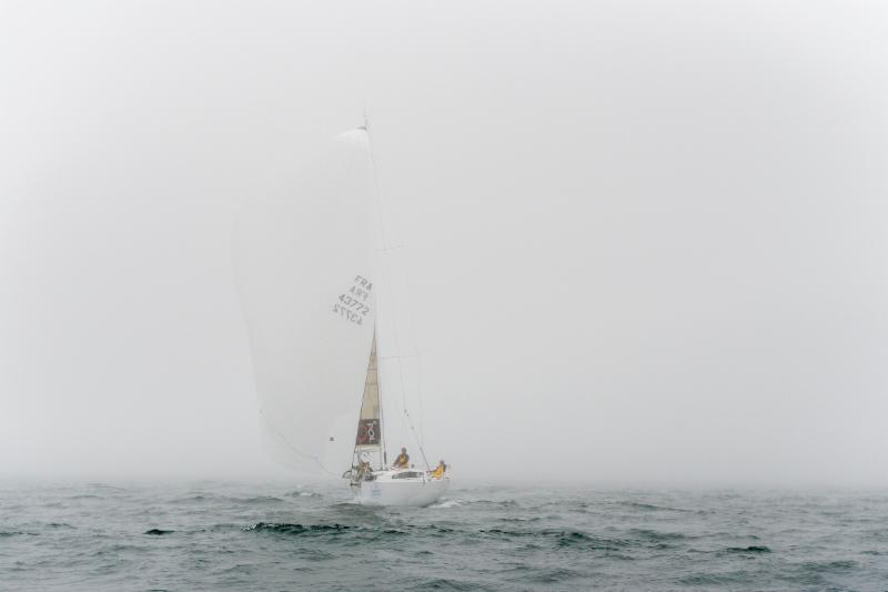 The 2015 Rolex Fastnet Race Fastnet Challenge Cup winner: Courrier Du Leon (FRA) sailing through the mist towards Plymouth for the finish of the 46th Rolex Fastnet Race and overall victory for Géry Trentesaux photo copyright Rolex / Daniel Forster taken at  and featuring the IRC class