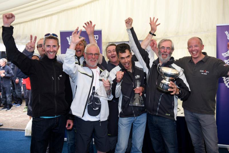 Clutching prizes for securing first place overall in IRC Three and the RORC IRC National Championship trophy (joint winner with Yes!), the crew of Dunkerque - Les Dunes de Flandre - photo © Rick Tomlinson / www.rick-tomlinson.com