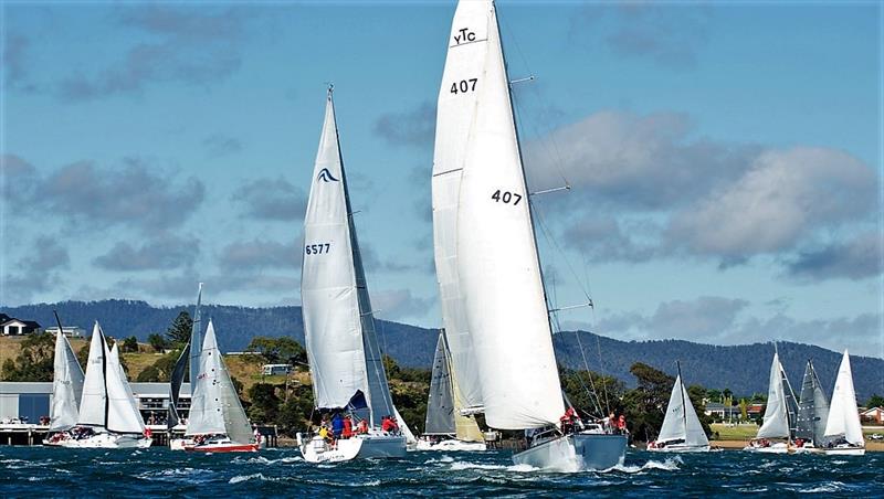 Start of the Launceston to Hobart Yacht Race in 2014 with Tamar Yacht Club entrant Allusive in the foreground photo copyright Dane Lojek taken at Derwent Sailing Squadron and featuring the IRC class