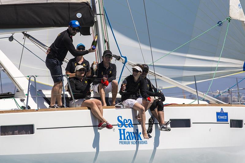 Crew enjoy some bubbles aboard 'Champagne' at Sealink Magentic Island Race Week - photo © Andrea Francolini / SNIRW