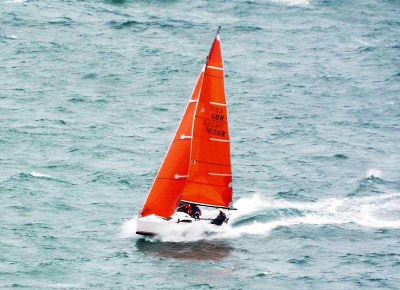 Crumpet off Noirmont Point during the Rossborough Round the Island (Jersey) Race photo copyright Bill Harris taken at Royal Channel Islands Yacht Club and featuring the IRC class