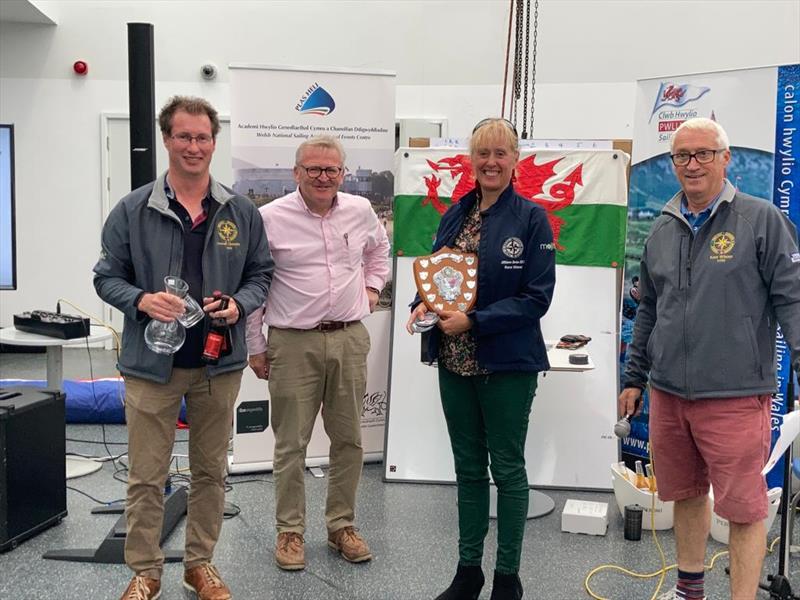 Peter Dunlop and Vicky Cox - Mojito receiving the Samedra Trophy and glassware from Stephen Tudor (Hon Secretary) and Mark Thompson (Vice commodore of PSC) at the Tremadog Bay Pop-Up Regatta photo copyright Eleri Griffiths taken at Pwllheli Sailing Club and featuring the IRC class