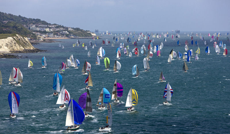 Part of the 1,750 boat fleet in the JPMorgan Asset Management Round the Island Race streams past Ventnor photo copyright TH Martinez / Sea&Co / onEdition taken at  and featuring the IRC class