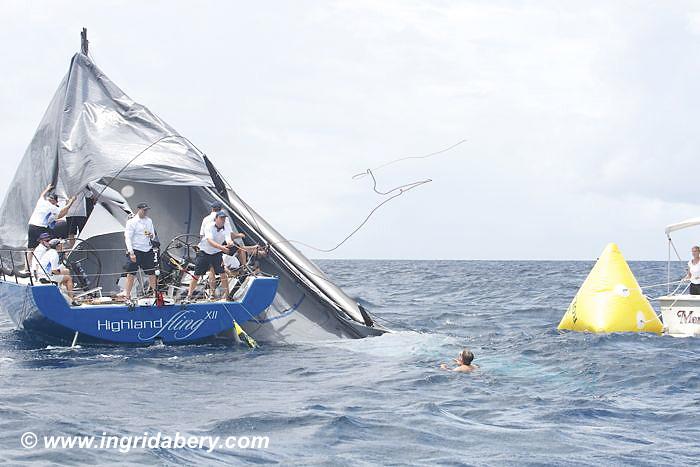 Highland Fling drops her rig on day 1 of the International Rolex Regatta photo copyright Ingrid Abery / www.ingridabery.com taken at St. Thomas Yacht Club and featuring the IRC class