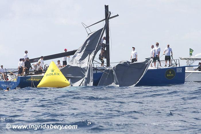 Highland Fling drops her rig on day 1 of the International Rolex Regatta photo copyright Ingrid Abery / www.ingridabery.com taken at St. Thomas Yacht Club and featuring the IRC class