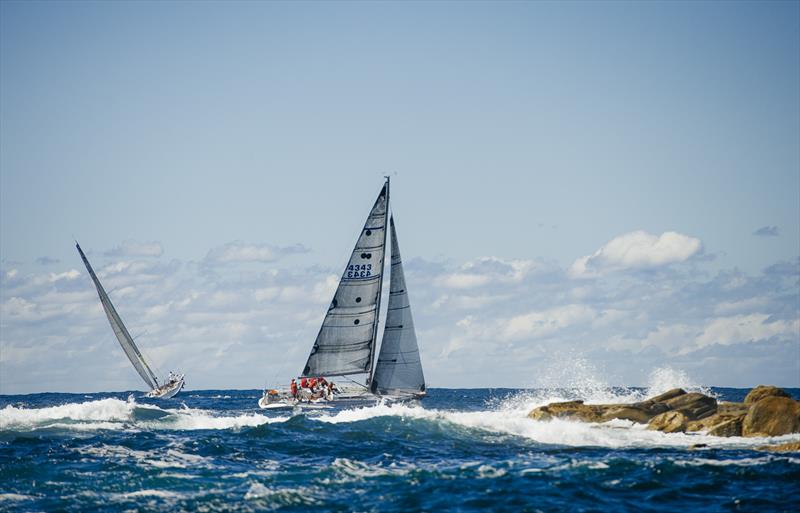 Wild Rose turning right at Sydney Heads during the Flinders Islet Race photo copyright Brett Hemmings / www.sailpix.com.au taken at Cruising Yacht Club of Australia and featuring the IRC class
