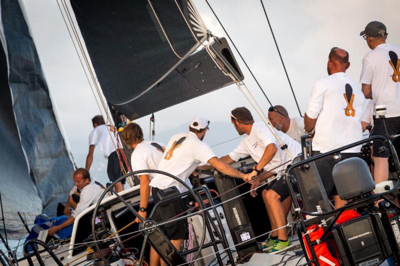 Expert teamwork on board Teasing Machine, competing in only her second offshore and first transatlantic race photo copyright RORC / Arthur Daniel taken at  and featuring the IRC class