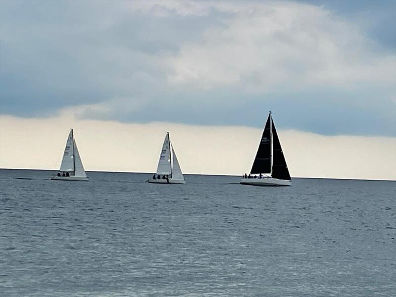 Mojito leading with J70s Sgrech Bach and Mojito Bach behind n the second race of the ISORA 2023 Welsh Coastal Race in Pwllheli photo copyright Karen Cartwright taken at Pwllheli Sailing Club and featuring the IRC class
