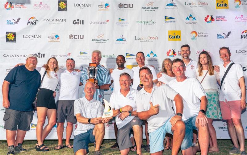 Chris Woods team on his Swan 49 Assuage celebrate their CSA 4 win and third overall - Antigua Sailing Week photo copyright Visual Echo taken at Antigua Yacht Club and featuring the IRC class