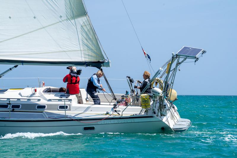 Channel 5 filming aboard Chris Fritot and Deborah Hutchings' yacht Mystique of Jersey during the Jersey Electricity Gorey Regatta photo copyright Simon Ropert taken at Royal Channel Islands Yacht Club and featuring the IRC class