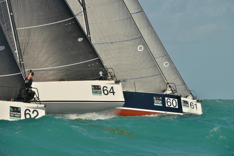 J/111's holding lanes off the start line on day 1 at Quantum Key West Race Week photo copyright Quantum Key West Race Week / www.PhotoBoat.com taken at Storm Trysail Club and featuring the J111 class