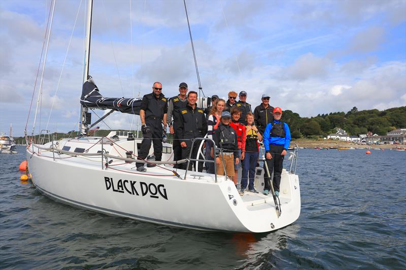 The Helford River Children's Sailing Trust crew aboard Black Dog photo copyright Collin Faulkner taken at Royal Cornwall Yacht Club and featuring the J111 class