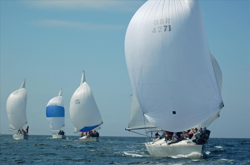 J/24s competing in the Port of Plymouth Regatta photo copyright Clare Gilbert taken at  and featuring the J/24 class