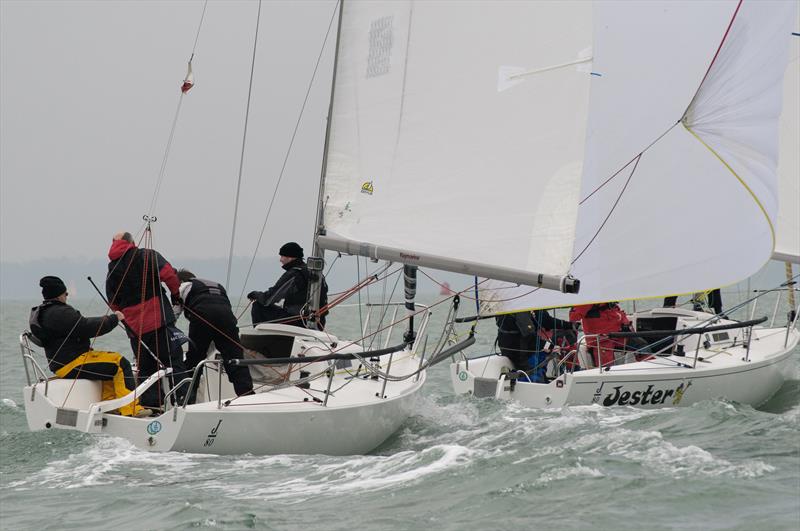 'Betty' chases 'Jester' on day 1 of the Brooks Macdonald Warsash Spring Series photo copyright Iain Mcluckie taken at Warsash Sailing Club and featuring the J80 class