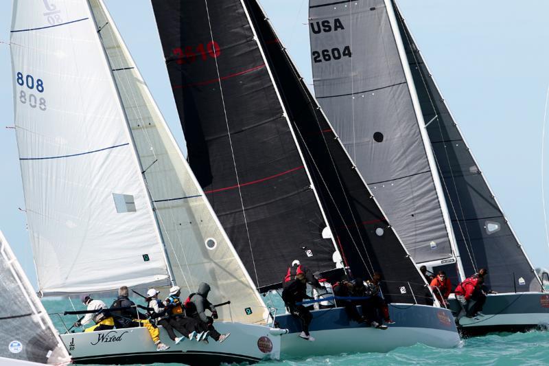 J/80 Wired hanging tough off the start with the GP 26's on day 3 of Quantum Key West Race Week 2016 photo copyright Max Ranchi / Quantum Key West taken at Storm Trysail Club and featuring the J80 class