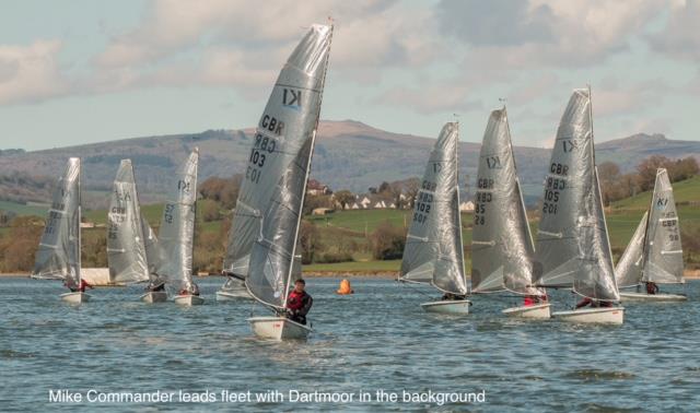 Mike Commander leads with Dartmoor in the background during the K1 Travellers Open at Teign Corinthian photo copyright Garnett Showell taken at Teign Corinthian Yacht Club and featuring the K1 class