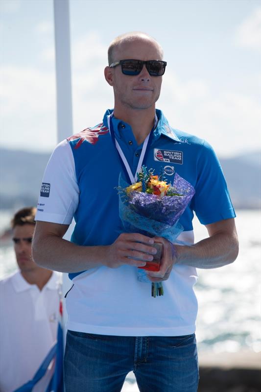 Nick Thompson takes Bronze on the Laser podium after the ISAF Sailing World Championship photo copyright Ocean Images / British Sailing Team taken at  and featuring the ILCA 7 class