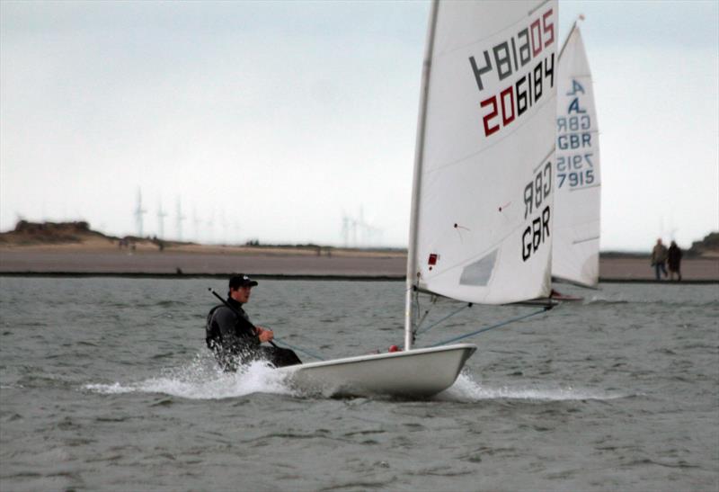 Ian McCloughlin wins on New Year's Day photo copyright Alan C.M. Jenkins taken at West Kirby Sailing Club and featuring the ILCA 7 class