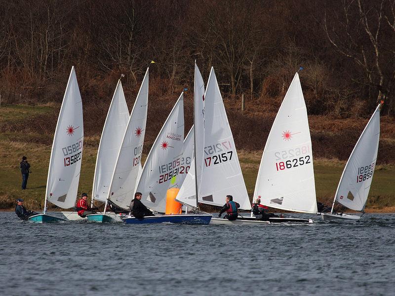 Lasers fighting for room on day 8 of the Alton Water Frostbite Series photo copyright Tim Bees taken at Alton Water Sports Centre and featuring the ILCA 7 class