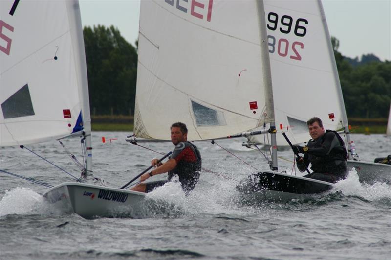 High speed reach at Island Barn Reservoir Laser Open photo copyright Jim Champ taken at Island Barn Reservoir Sailing Club and featuring the ILCA 7 class
