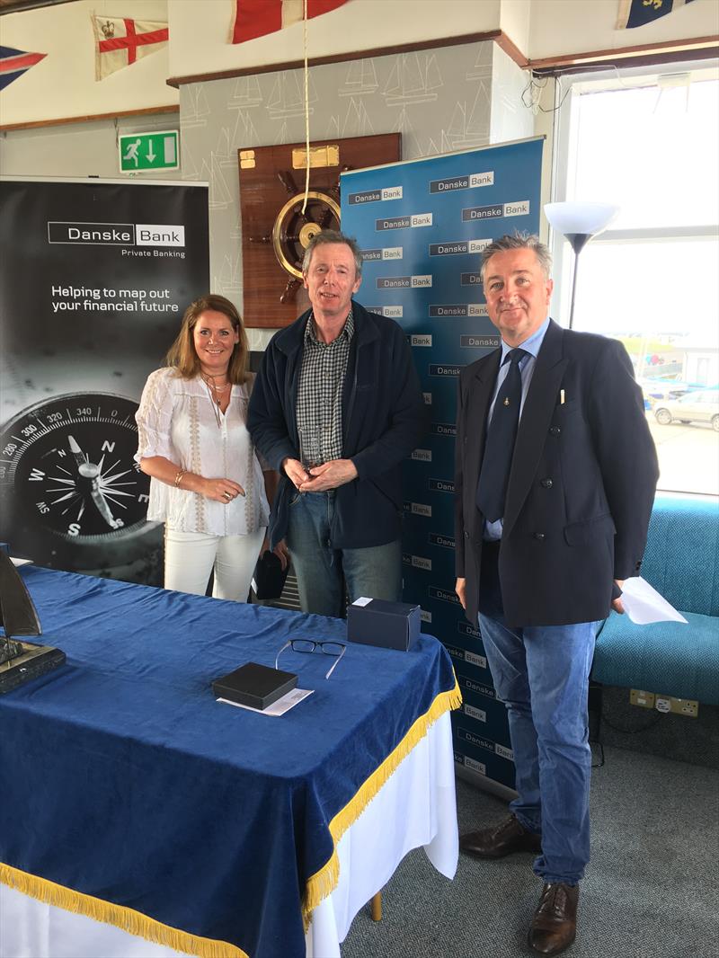 Great Grand Master Chris Boyd with Event Organiser Claire Storey and Rear Commodore Ruan O'Tiarnaigh at the Danske Bank Private Banking Irish Laser Masters Championship photo copyright Mark Mackey taken at Ballyholme Yacht Club and featuring the ILCA 7 class