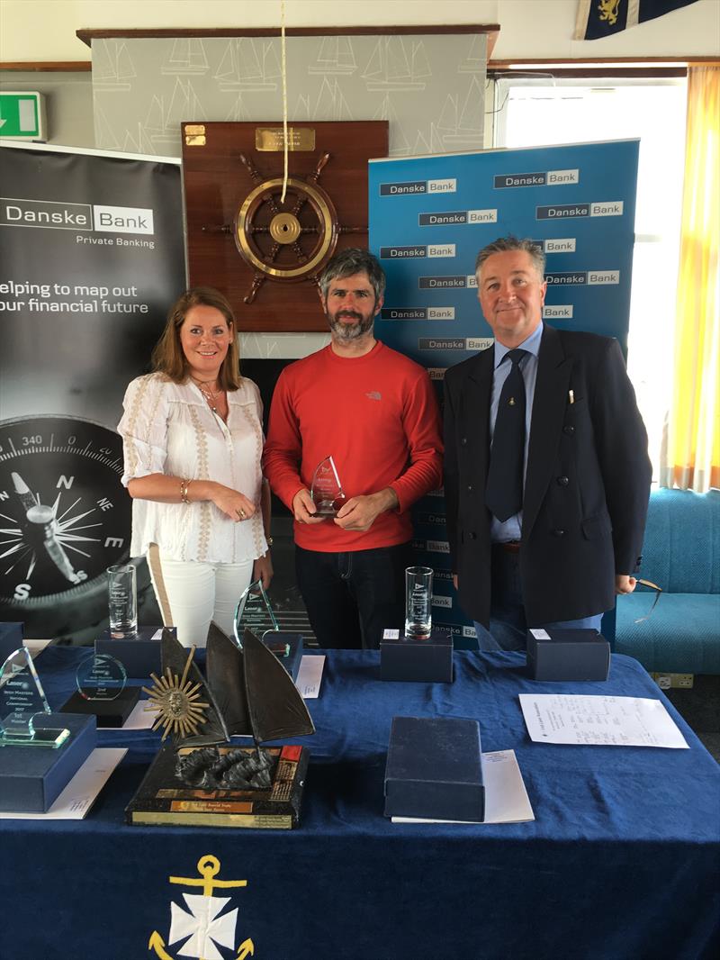 Apprentice Master Paul O'Sullivan with Event Organiser Claire Storey and Rear Commodore Ruan O'Tiarnaigh at the Danske Bank Private Banking Irish Laser Masters Championship photo copyright Mark Mackey taken at Ballyholme Yacht Club and featuring the ILCA 7 class