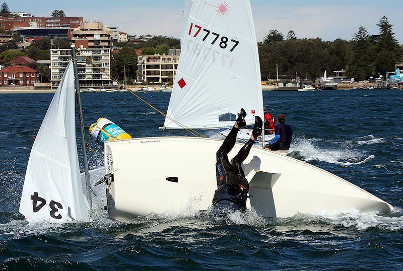 An unfortunate moment in the Laser Masters World Championship in Sydney 2009 - photo © Bob Ross