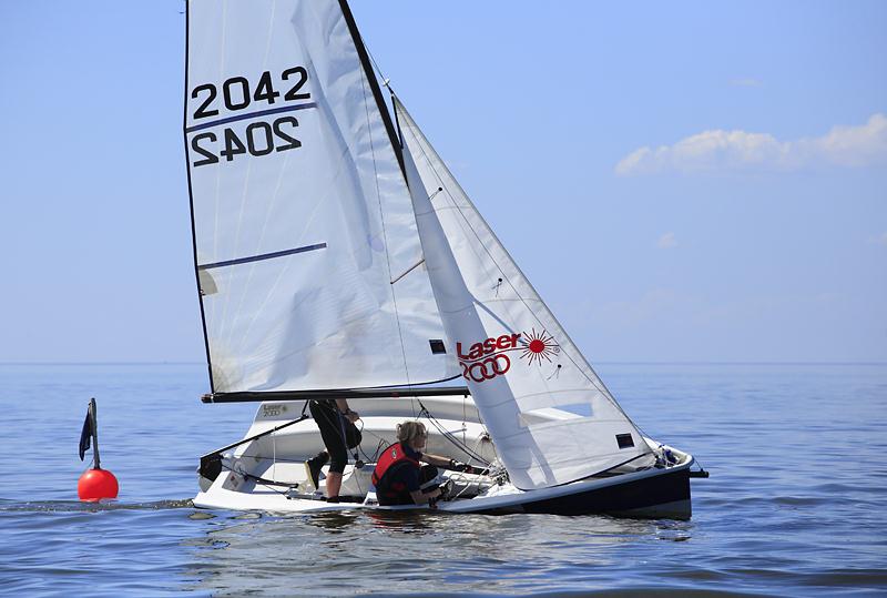 Light winds for the Laser 2000 Millennium Series event at Snettisham Beach photo copyright Stuart Aylmer / www.northnorthwest.co.uk taken at Snettisham Beach Sailing Club and featuring the 2000 class