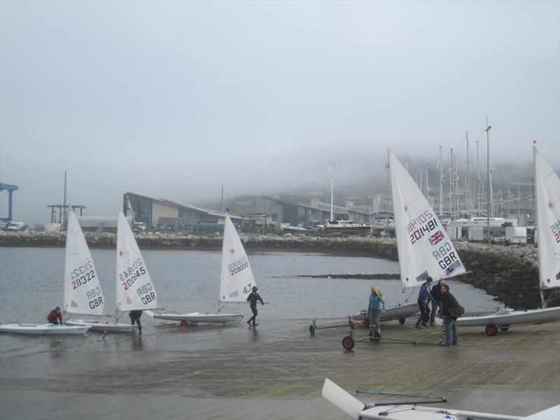 Returning as the fog clears slightly during the Laser Qualifier in Weymouth photo copyright Olly Perkins taken at Weymouth & Portland Sailing Academy and featuring the ILCA 4 class