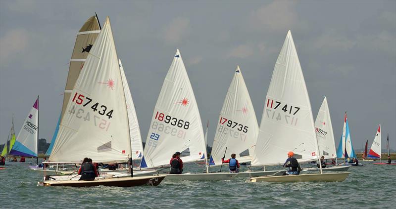 Close racing among the Laser Radials in the fast fleet at the West Sussex Schools and Youth Association Regatta photo copyright Dave Lee taken at  and featuring the ILCA 6 class
