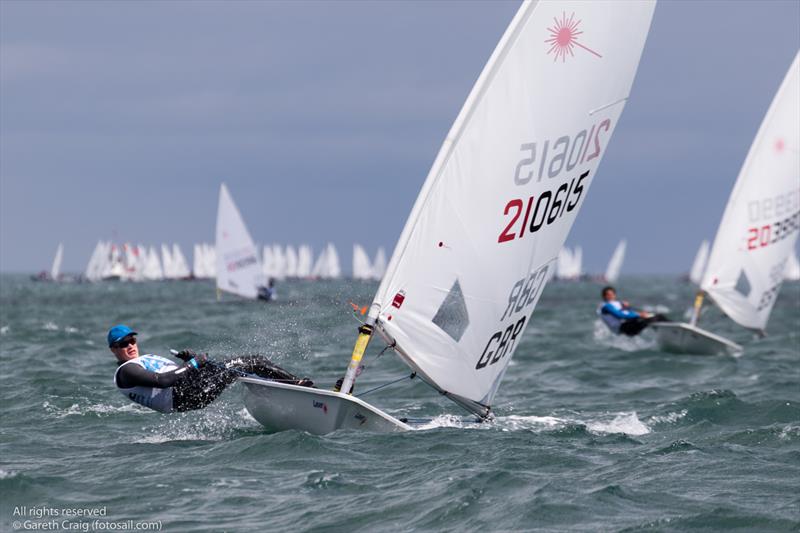 Jamie Calder on day 4 of the KBC Laser Radial World Championships in Ireland photo copyright Gareth Craig / www.fotosail.com taken at Royal St George Yacht Club and featuring the ILCA 6 class
