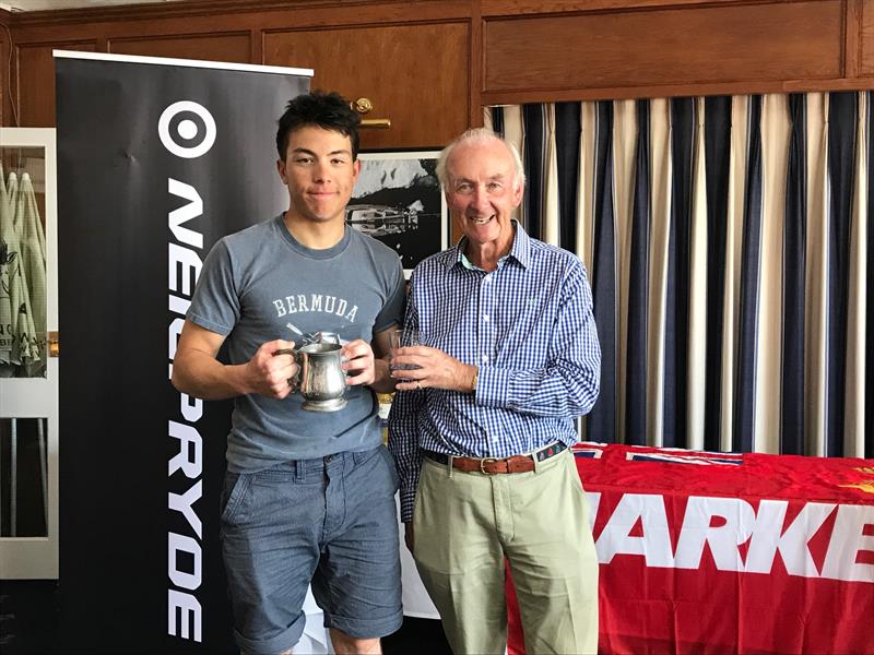 Commodore Dunlop Stewart presenting to Milo Gill-Taylor, Overall winner Radials, 1st boy and 1st Royal Lymington sailor in the Royal Lymington Yacht Club Youth Laser Open photo copyright Christine Spreiter taken at Royal Lymington Yacht Club and featuring the ILCA 6 class