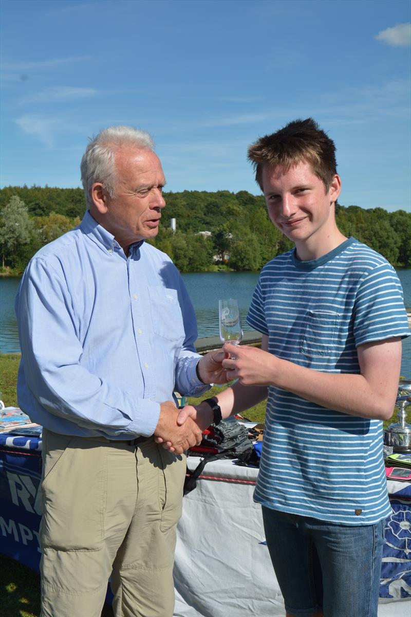 Trident Youth Travellers - Dave Williamson of the RYA presents Innes Bamford with his prize (Southern) photo copyright Ian S Smith taken at Ripon Sailing Club and featuring the ILCA 6 class