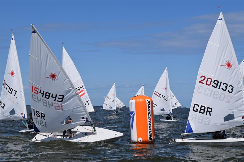 Laser Radial Youth Worlds at Medemblik day 1 photo copyright Eric Faust taken at Regatta Center Medemblik and featuring the ILCA 6 class