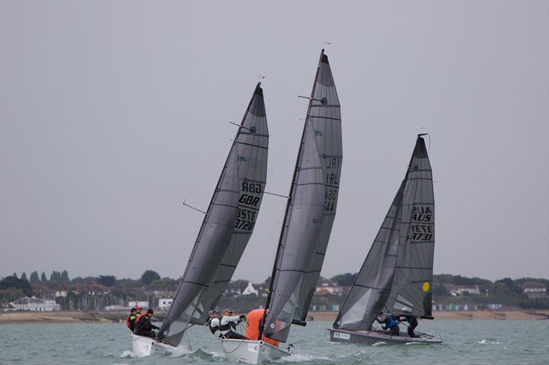 Nick Rogers, sailing Black, in pursuit of two boats on day 4 of the SB20 Worlds at Cowes photo copyright Jennifer Burgis taken at Royal Yacht Squadron and featuring the SB20 class