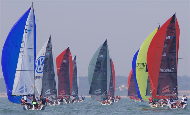 The fleet made a colourful spectacle on day 4 of the SB20 Worlds at Cowes photo copyright Jennifer Burgis taken at Royal Yacht Squadron and featuring the SB20 class