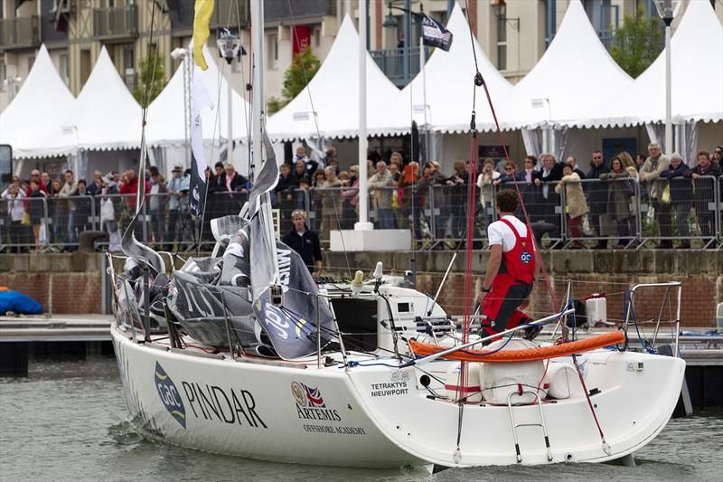 GAC Pindar skipper Jack Bouttell motors into Deauville for the official opening of the race village to the cheers of hundreds lining the marina photo copyright Ocean Image taken at  and featuring the Figaro class