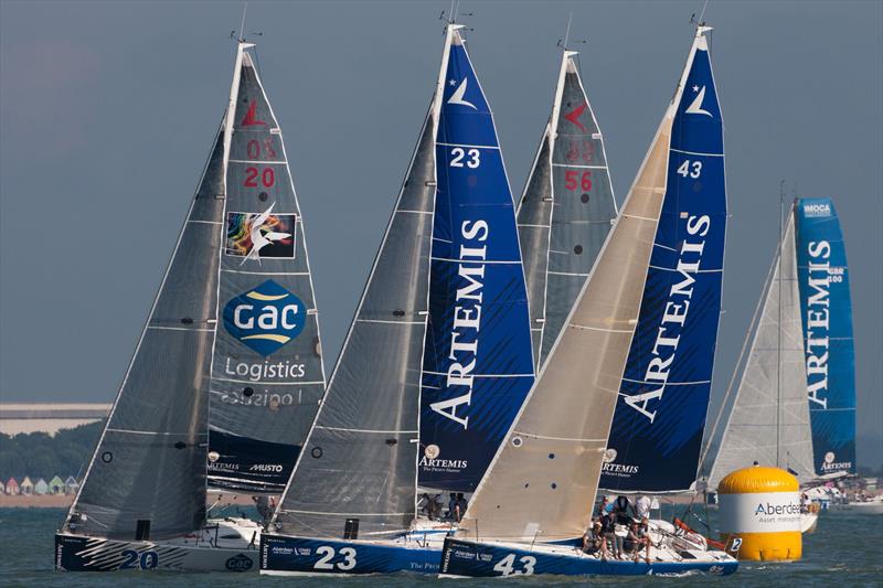 The fleet of Artemis Offshore Academy Figaros go head to head during racing in the 2014 Artemis Challenge photo copyright Lloyd Images taken at Cowes Combined Clubs and featuring the Figaro class