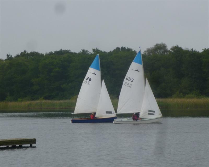 The Ayres and Sherwens in close racing during race 2 of the Leader open at Rollesby Broad photo copyright John Ayres taken at Rollesby Broad Sailing Club and featuring the Leader class