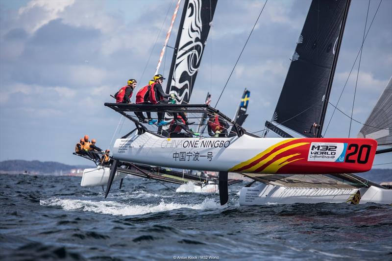 M32 World Championship - Phil Robertson and 'ChinaOne Ningbo' turned in the most consistent four scores on day 2 photo copyright Anton Klock / M32 Worlds taken at  and featuring the M32 class