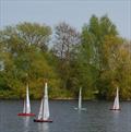 2024 Mermaid Trophy GAMES 4 at Guildford: Oliver's red F6 leads Rob's UP (41), Barrie's STARKERS (103) & Lewis' STARKERS (77) downwind to the gate © Celia Greetham