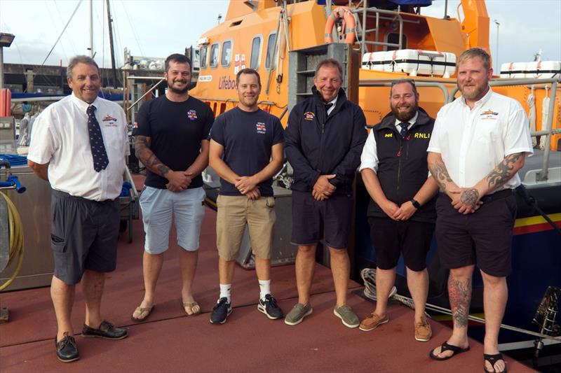 Penlee RNLI lifeboat crew involved in the Silver medal service. (L-R) Adrian Thomas, James Roberts, Will Treneer, Patch Harvey, Trevelyan Worth and Marcel Le Breton. (missing from this image is Dan Sell) photo copyright Phil Monckton taken at  and featuring the Marine Industry class